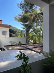 Zahrada ubytování Villa Compartida con Vistas al Mar y la Montaña + 14 fotografií