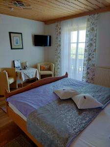 Postel nebo postele na pokoji v ubytování Weingut Stoff