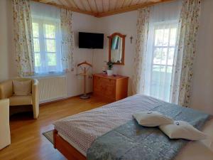 Postel nebo postele na pokoji v ubytování Weingut Stoff