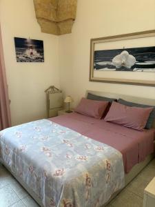 Ένα ή περισσότερα κρεβάτια σε δωμάτιο στο Casa Terrazzata in centro