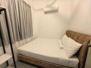 Ένα ή περισσότερα κρεβάτια σε δωμάτιο στο Simfoni Comfy Premium 13 +29 φωτογραφίες
