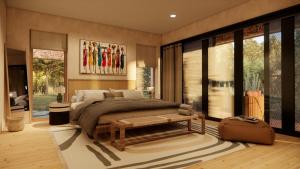 a bedroom with a large bed and a table at Mapito Safari Camp, Serengeti, Autograph Collection in Serengeti
