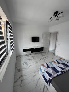 Televisyen dan/atau pusat hiburan di Apartament X7! +2 gambar