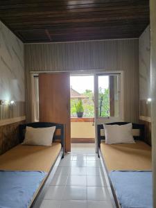 Posezení v ubytování Bulan Bali Guest House