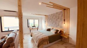 A bed or beds in a room at Sunset Paradise