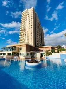 The swimming pool at or close to Sunset Paradise