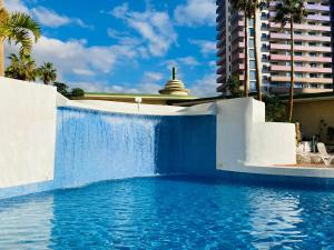 The swimming pool at or close to Sunset Paradise