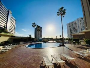 The swimming pool at or close to Sunset Paradise