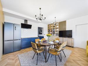 Kuchyň nebo kuchyňský kout v ubytování ApartamentySnu, Jagielloński Penthouse + 12 fotografií