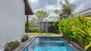 Πισίνα στο ή κοντά στο 2BR Rice Fields Villa Santa 4 in Cemagi
