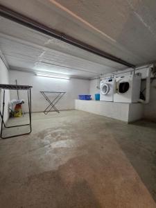 Η κουζίνα ή μικρή κουζίνα στο TAKAppartement Dormagen