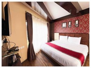 Zambala Retreat & Spa Darjeeling客房内的一张或多张床位