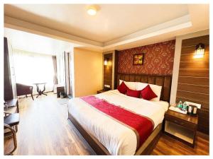 Zambala Retreat & Spa Darjeeling客房内的一张或多张床位