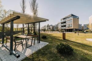 Bygningen som lejligheden ligger i + 7 billeder