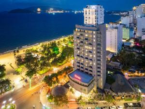 an aerial view of a city at night at MissBamboo Hotel Nha Trang in Nha Trang