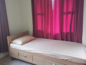 Postel nebo postele na pokoji v ubytování Baloo's Family homestay