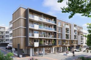an architectural rendering of a building with people on balconies at Oh Activ Donville-Les-Bains - Résidence Services Seniors in Donville-les-Bains +2 photos