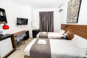 Postel nebo postele na pokoji v ubytování Luxury New 2 Single Bed Studio with views - BV6