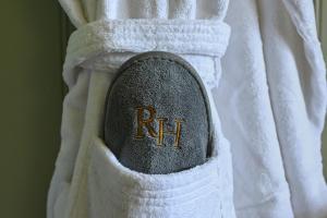 a towel with the rtk on the side of a robe at Renvyle House Hotel & Resort in Renvyle
