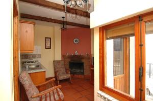 Kuchyň nebo kuchyňský kout v ubytování Apartamentos Turísticos Rural Los Tinaos