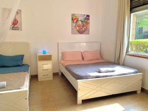 Krevet ili kreveti u jedinici u okviru objekta WanderHome 3BDR House