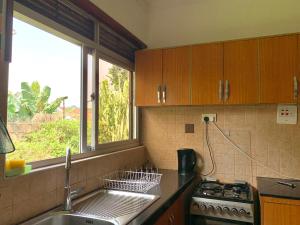Kuhinja ili čajna kuhinja u objektu WanderHome 3BDR House