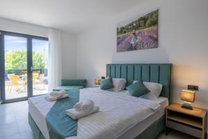 Ένα ή περισσότερα κρεβάτια σε δωμάτιο στο Villa Superiore in Jakovici +38 φωτογραφίες