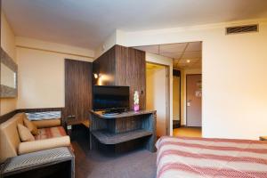 TV o dispositivi per l'intrattenimento presso Hôtel & Résidence Octel