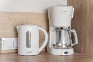two appliances sitting on a counter next to each other at Your Holidays Bel Mare 407D in Międzyzdroje