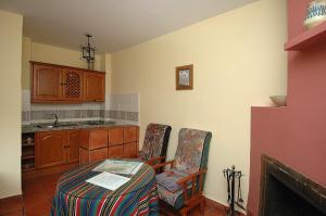 Kuchyň nebo kuchyňský kout v ubytování Apartamentos Turísticos Rural Los Tinaos
