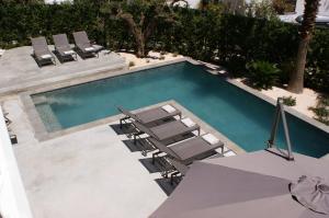 Bazén v ubytování Beautiful Family Home in Santa Eulalia, 1035 nebo v jeho okolí + 18 fotografií