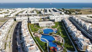 an aerial view of a resort near the ocean at Four Seasons Life by Sea Homes in Aglantzia