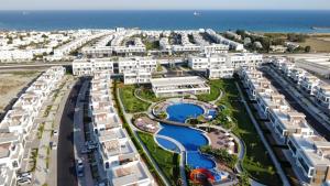 an aerial view of a resort near the ocean at Four Seasons Life by Sea Homes in Aglantzia