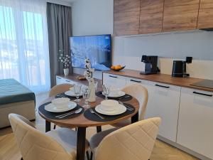 Η κουζίνα ή μικρή κουζίνα στο Apartamenty Marzeń Świeradów Zdrój