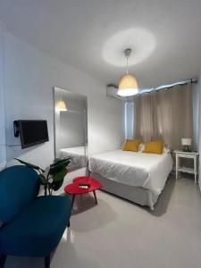 Postel nebo postele na pokoji v ubytování Hostal Berlin