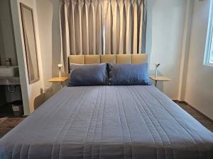 โรงแรมดีรูม D Room客房内的一张或多张床位