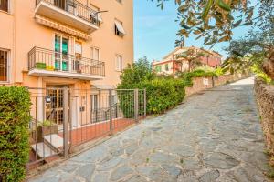 a cobblestone street in front of a building at Lerici sea view private parking best position in Lerici