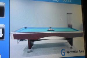 a picture of a pool table in a room at Superb Family Friendly Beach-Front Whole Flat, Great Views in Dubai +9 photos