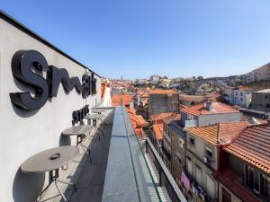 a view of the city from the roof of a building at Smartr Porto Reis de Gaia & Spa in Vila Nova de Gaia