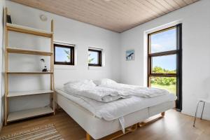 Postel nebo postele na pokoji v ubytování 890-Snedsted-Niels-Juels-Vej-41