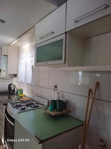 Kuchyň nebo kuchyňský kout v ubytování Alojamiento temporal Tandil MD&C