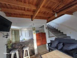 Posezení v ubytování Alojamiento temporal Tandil MD&C