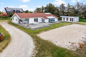 an aerial view of a house on the beach at 931-Thisted-Pinbak-24 in Torsted