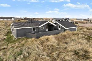 a house in the middle of a field at 1059-Klitmoller-Mollebakken-56 in Klitmøller +13 photos