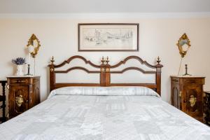 Ένα ή περισσότερα κρεβάτια σε δωμάτιο στο Suite Al Pian Apartment