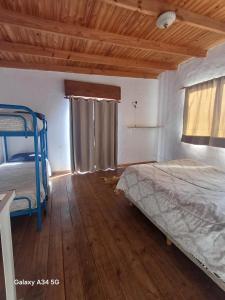 Postel nebo postele na pokoji v ubytování Alojamiento temporal Tandil MD&C