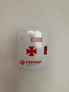 a thermometer on a white wall with a firemark on it at Casa La Peña in Luarca