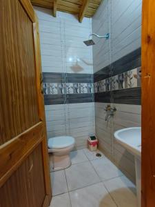 a bathroom with a toilet and a sink at Light House studio in Dahab