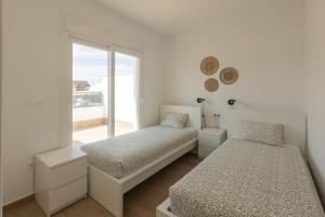 Postel nebo postele na pokoji v ubytování Villas Mar y Baleares - 16p - 12 beds - private pools + 40 fotografií