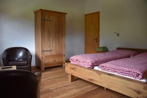 Postel nebo postele na pokoji v ubytování B&B Hängebrigga